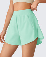 G4Free Chillwhisp 2.5" Dolphin Hem Running Shorts with Pockets